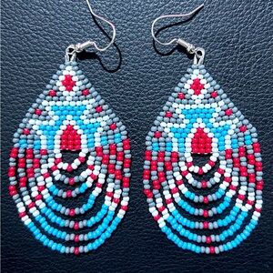 Light gray white light, blue and red seed bead fringe earrings